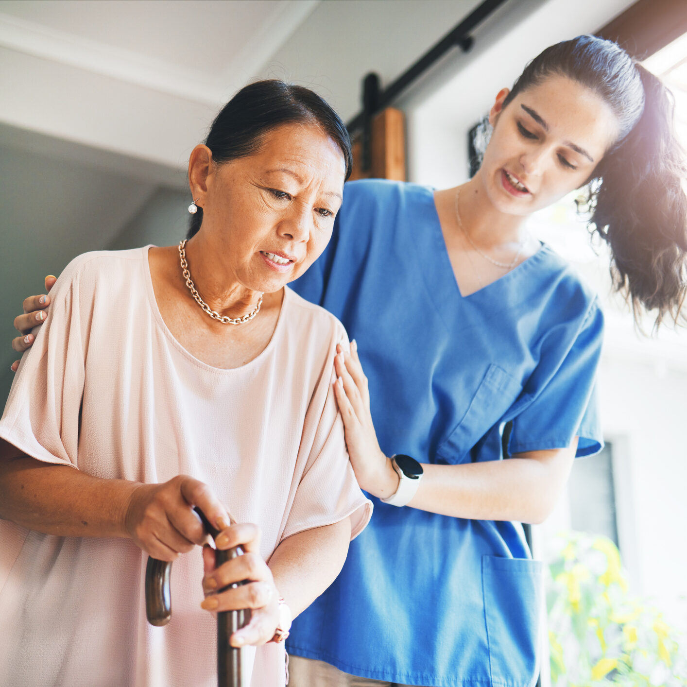 Walking stick, senior woman and nurse for home support, helping and kindness with retirement or nursing service. Medical student, doctor or caregiver and elderly patient with disability in healthcare